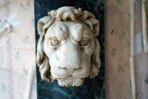 A 20thC Alabaster and Serpentine Marble Lion’s Mask Wall Plaque