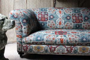 A Late Victorian Upholstered Chesterfield Sofa Attributed to James Shoolbred c.1890