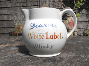 An Early 20thC Minton Pottery Whisky Jug for Dewar`s White Label