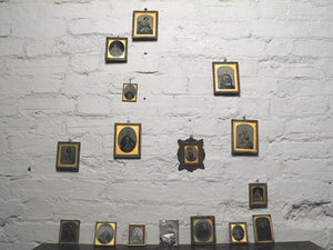 A Spooky Group Of Sixteen Mid 19thC Framed Ambrotype Portraits