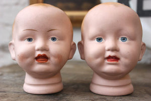 A Good Pair of Early 20thC Bisque Baby Doll Heads by The Diamond Pottery Co.