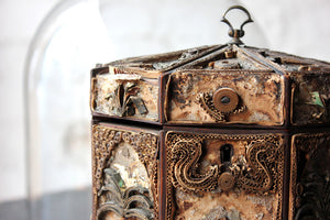 A Distressed George III Rolled Paper Filigree Octagonal Tea Caddy Under a 19thC Glass Dome