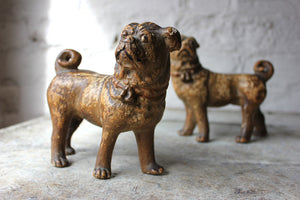 A Whimsical Pair of Early 20thC Gilt Painted Plaster Models of Pug Dogs