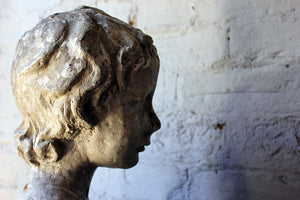 A Decorative 20thC Portrait Studio Plaster Bust of a Young Boy