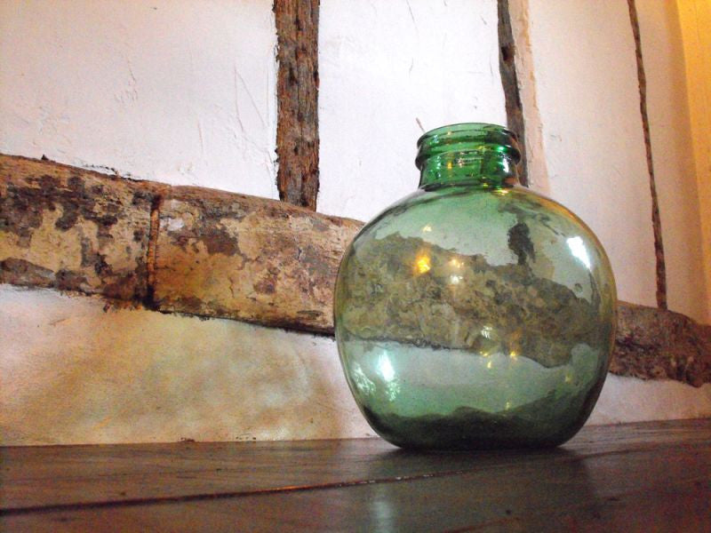 Large green glass bottle